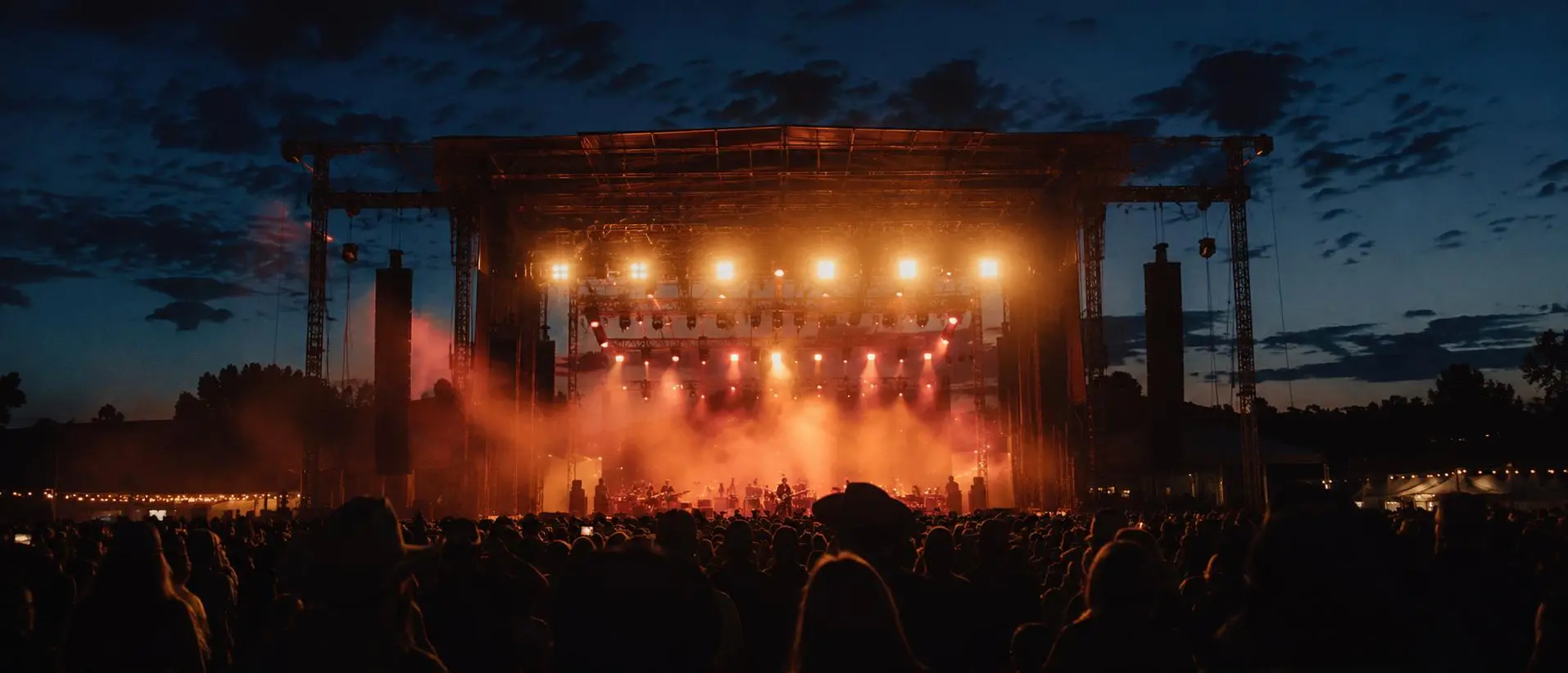 Stage and crowd at an outdoor country concert